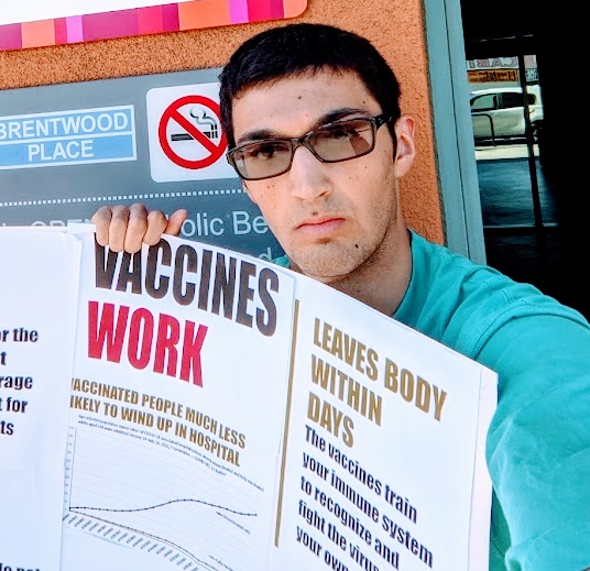 Raj Gupta demonstrating in support of vaccines